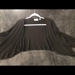 Black shrug with ruched sleeves. Avenue size 22/24
